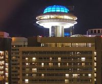Atlanta Hyatt Regency rooftop restaurant flying saucer night John Portman architect